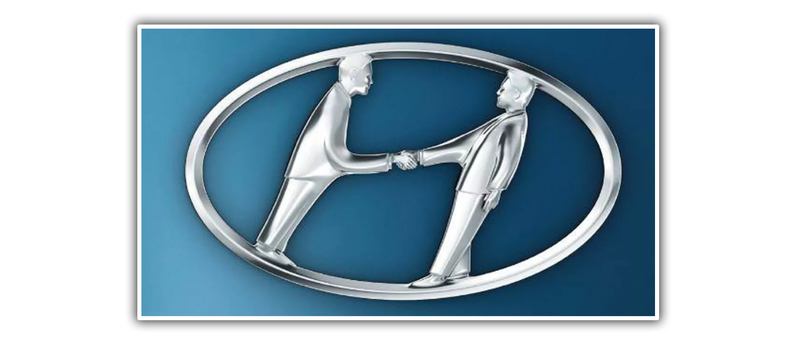 Illustration for article titled I Had No Idea The Hyundai Logo Was Based On Two Guys Shaking Hands
